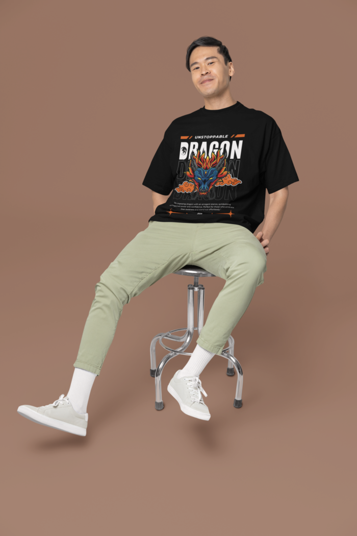 oversized-round-neck-tee-mockup-of-a-smiling-man-sitting-on-a-stool-in-a-studio-m38925 (3) Unisex Oversized Classic T-Shirt